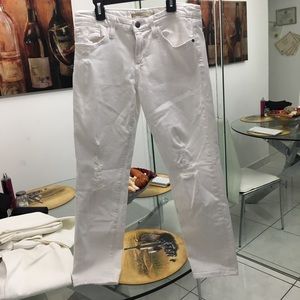 Stressed white skinny jeans